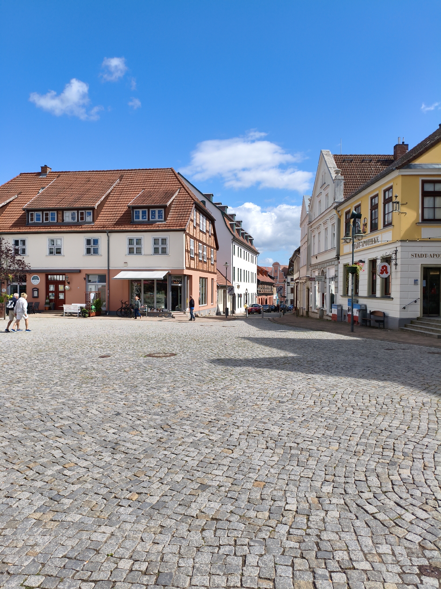 Strolling through a historic European cobblestone town center