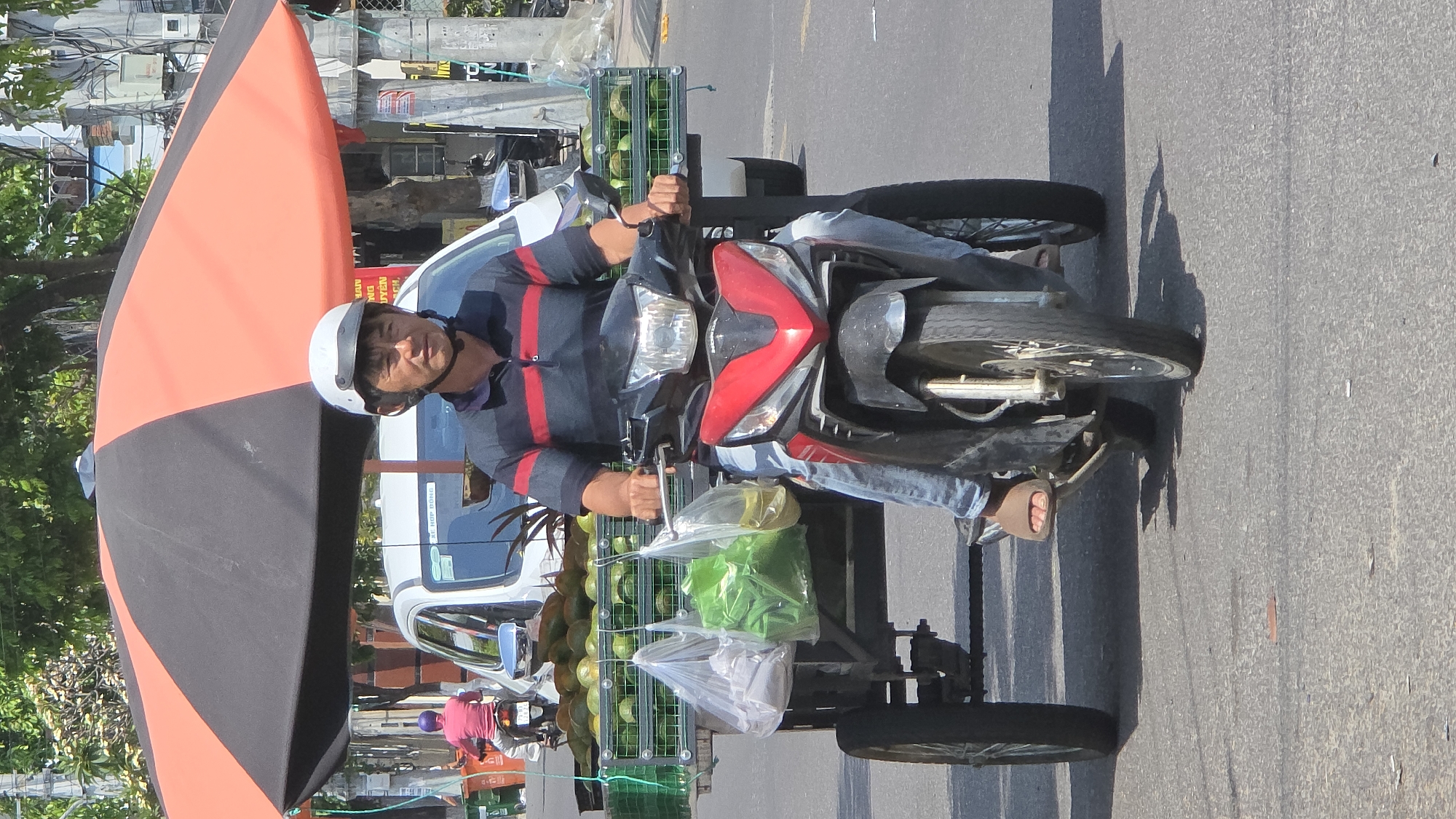 Morning motorcycle commute scenes captured across Nha Trang streets