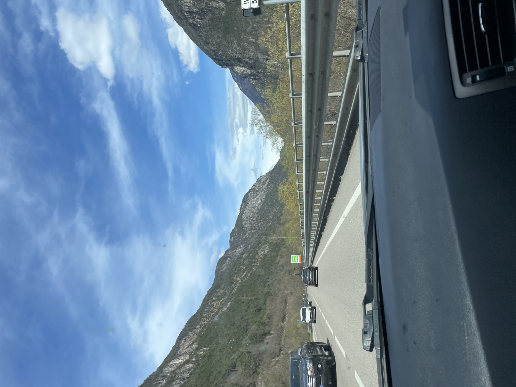 Highway traffic through Italian mountain region near Ospitale di Cadore