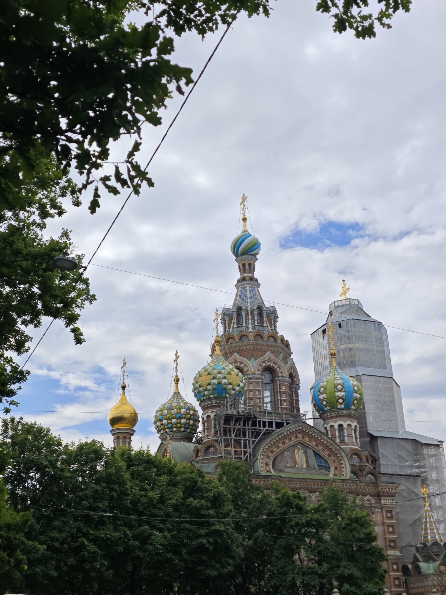 Tourist explores Saint Petersburg landmarks during overcast morning visit