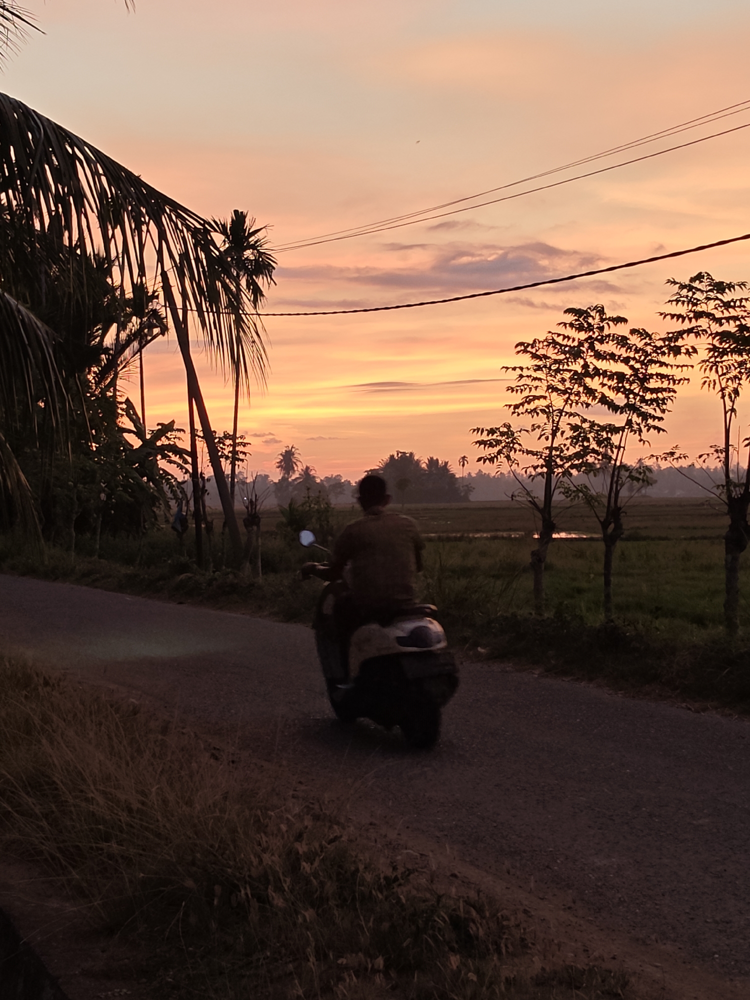 Tropical sunset in Meunasahalue, Indonesia, from multiple angles
