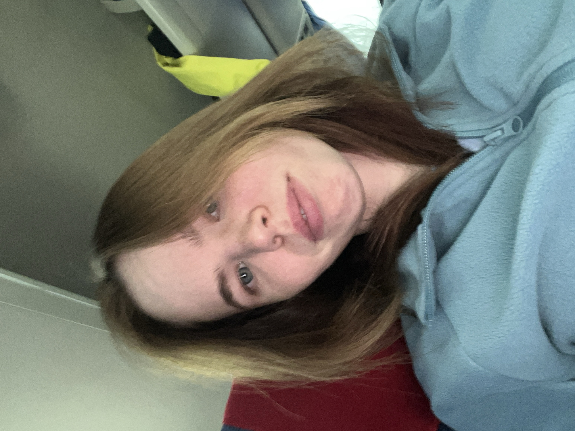 Woman takes selfie indoors in Perm, Russia