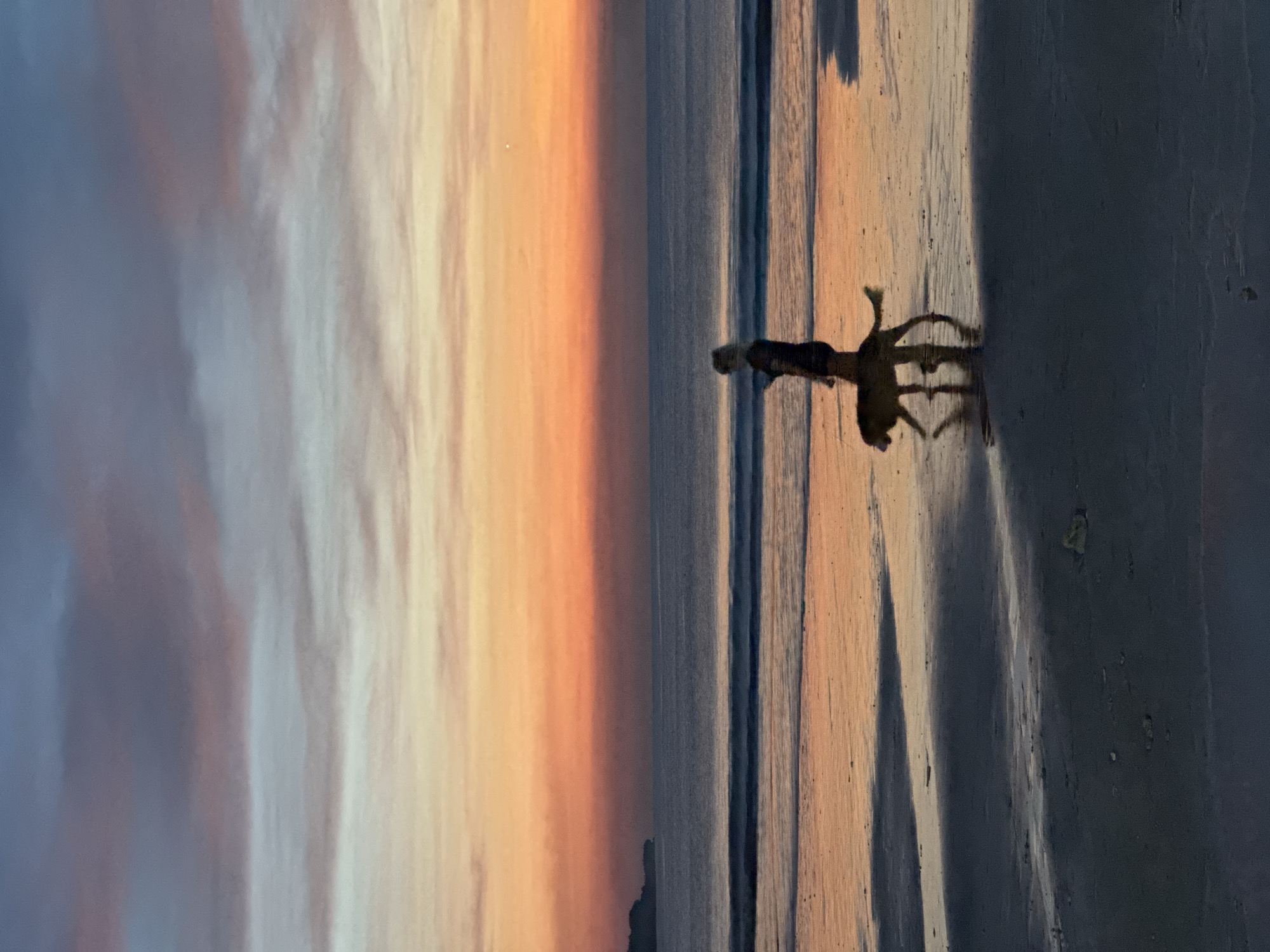 Sunset gathering documented at Kuta Selatan beach, Indonesia