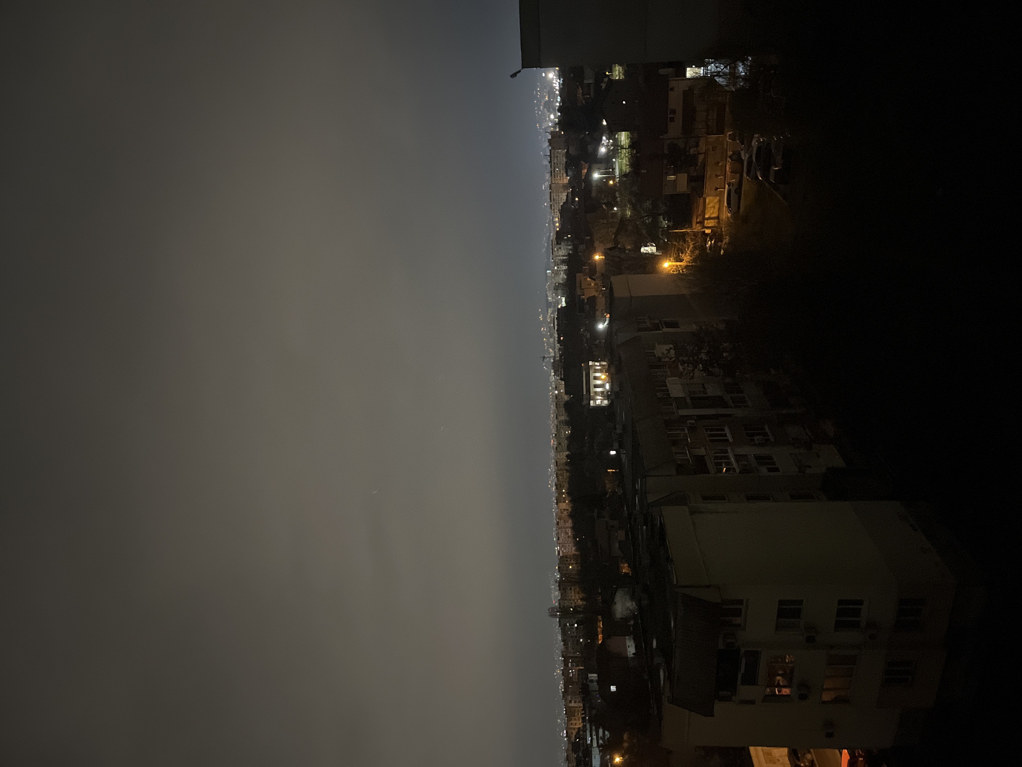 Foggy night blankets Sofia cityscape in atmospheric haze