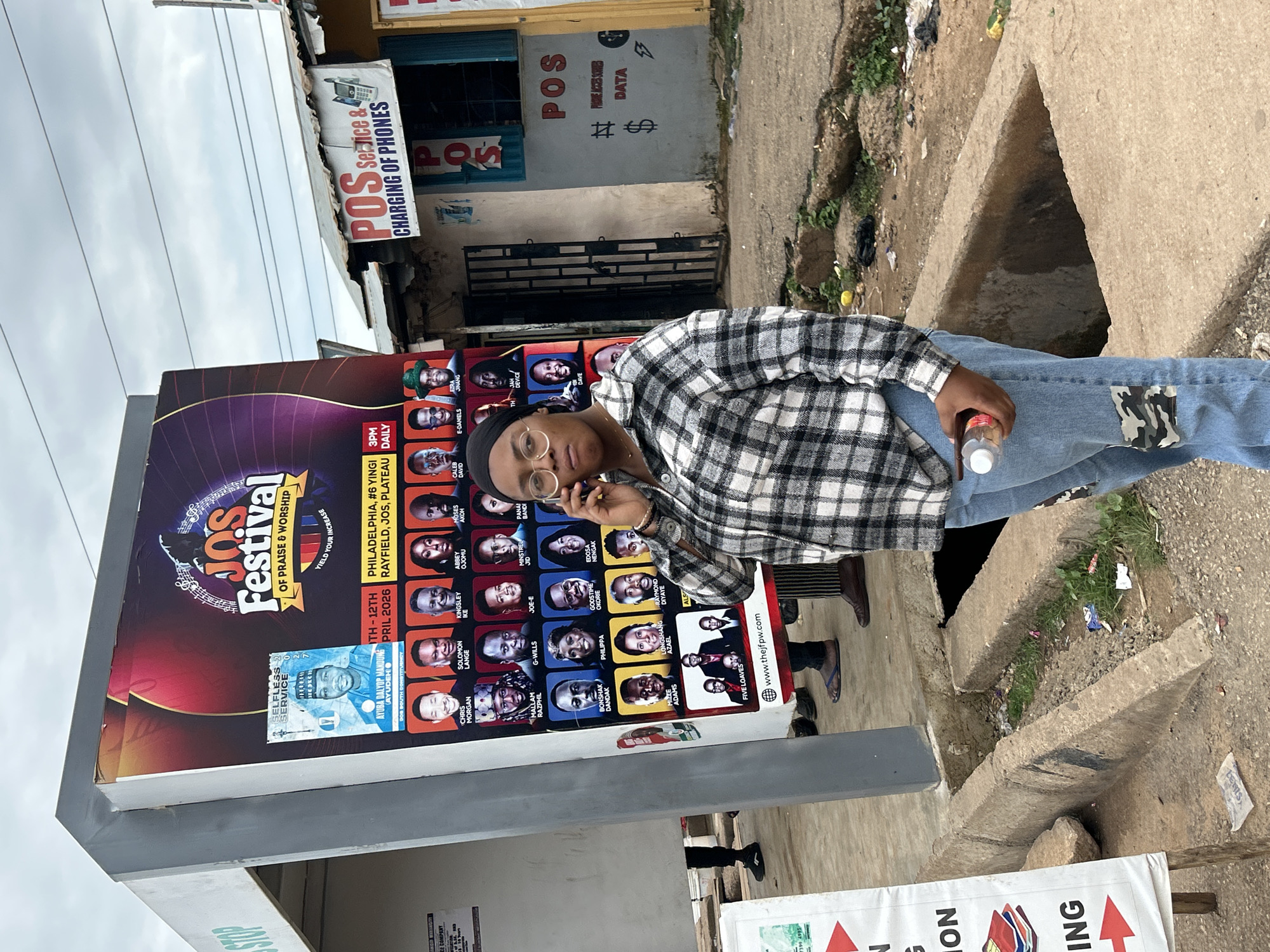 Everyday life on a busy market street in Jos, Nigeria