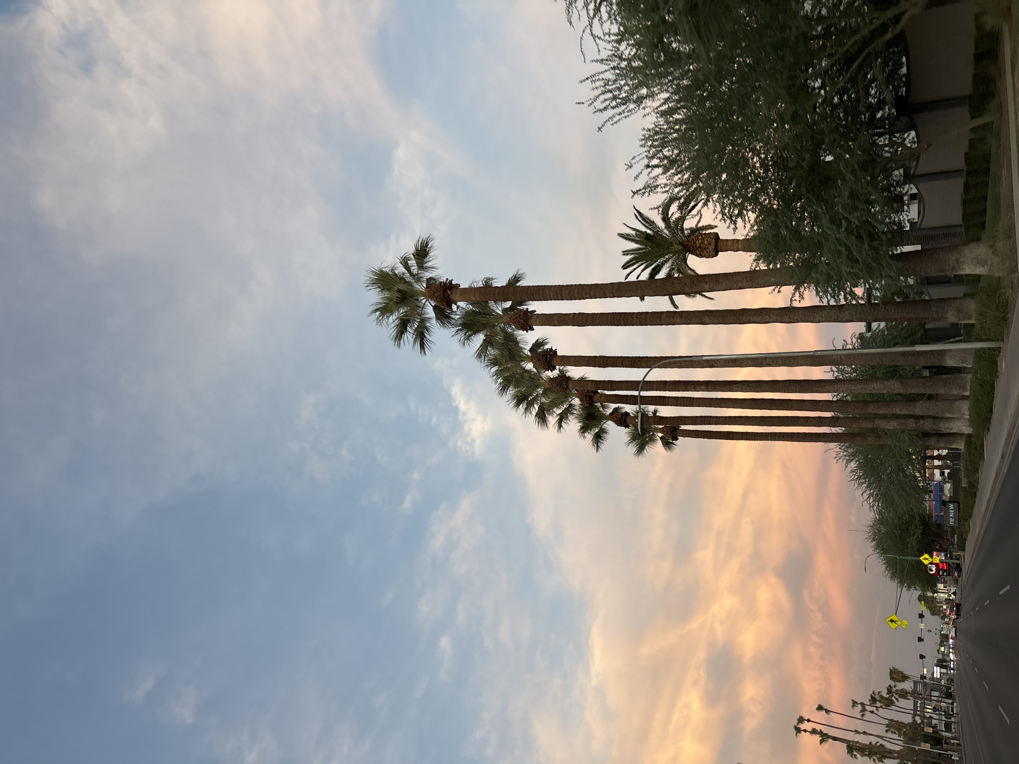 Sunset drive through Phoenix under a pastel sky