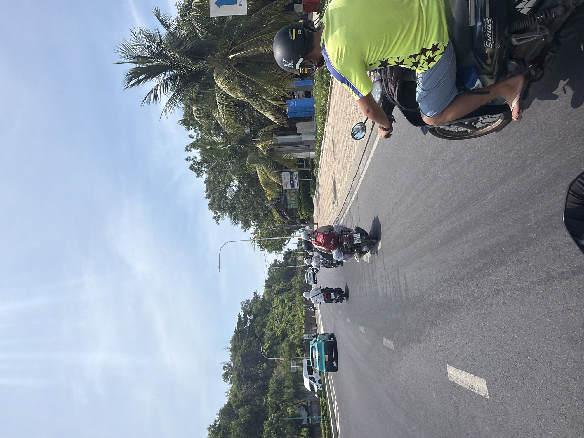 Morning motorcycle commute documented through Nha Trang streets