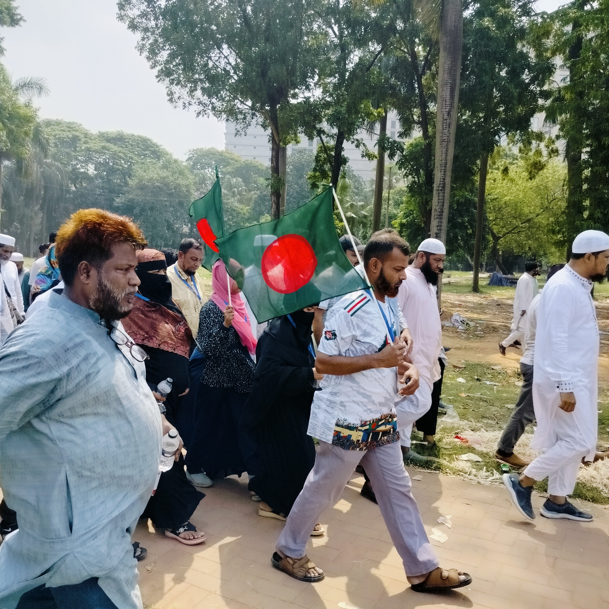 Early morning gathering and construction activity in Dhaka