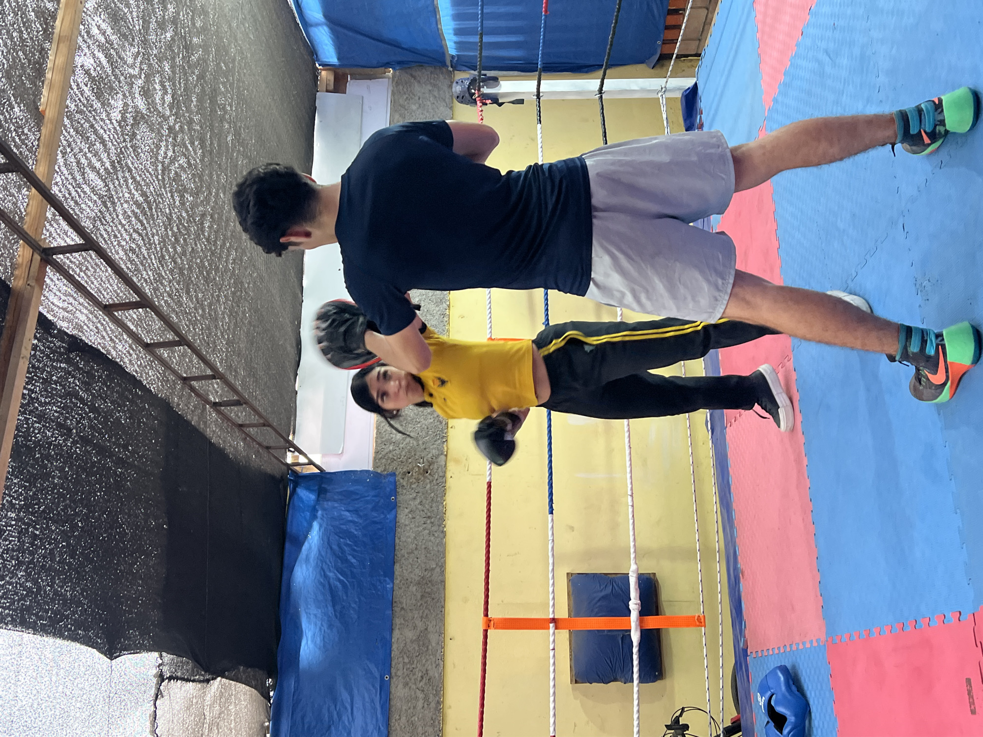 Boxing training and street repair work happening across Arica