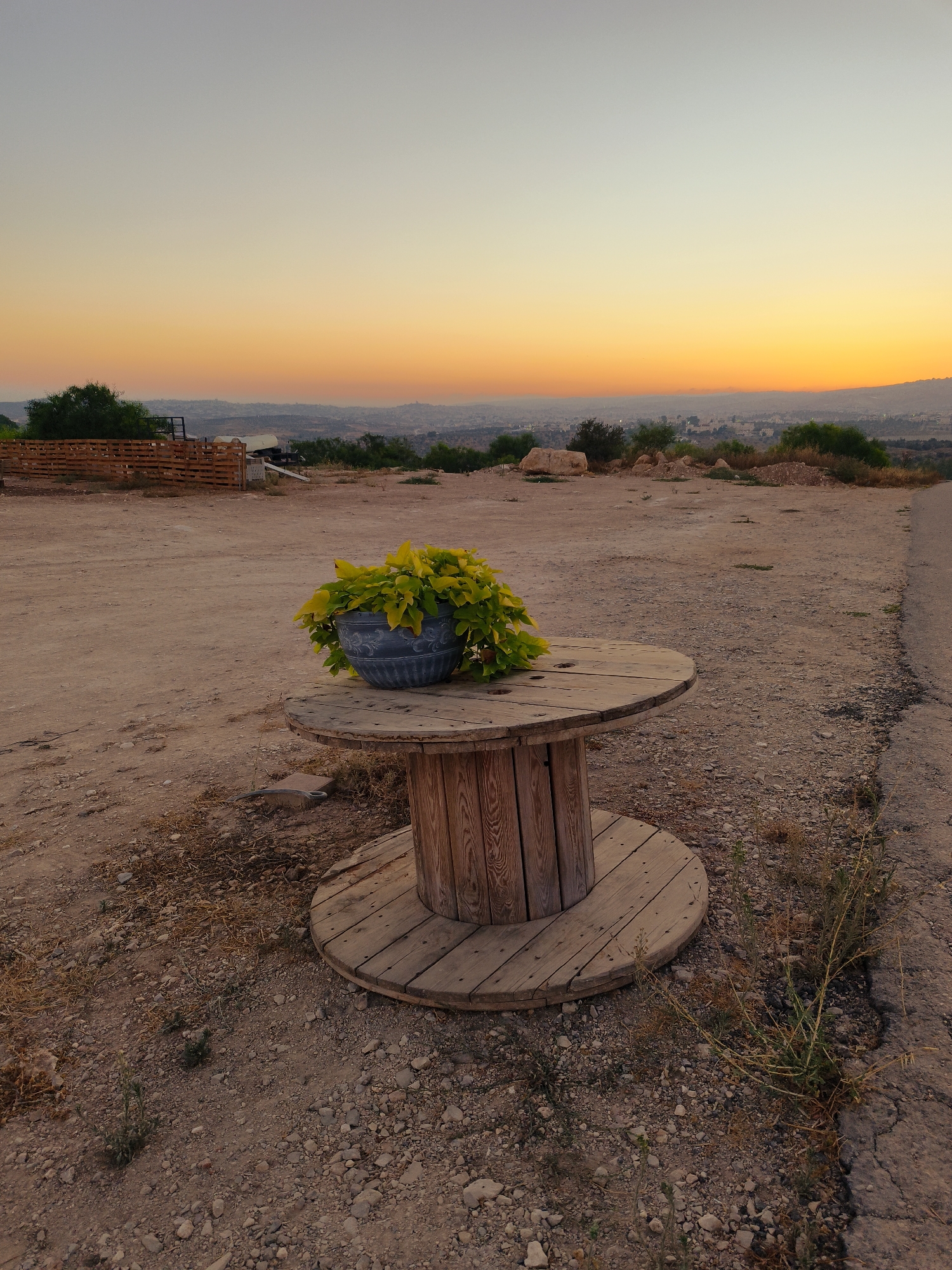 Dusk settles over a casual outdoor setup in Lachish, Israel