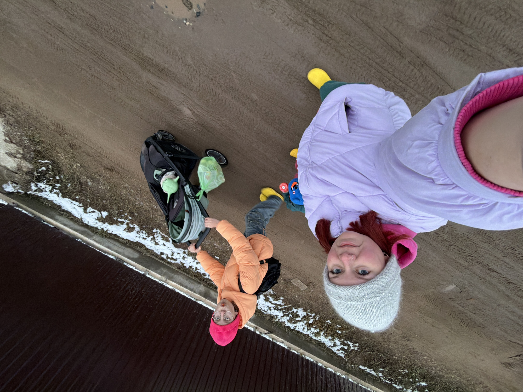 Mother and toddler's spring day outing in Chaikovsky, Russia