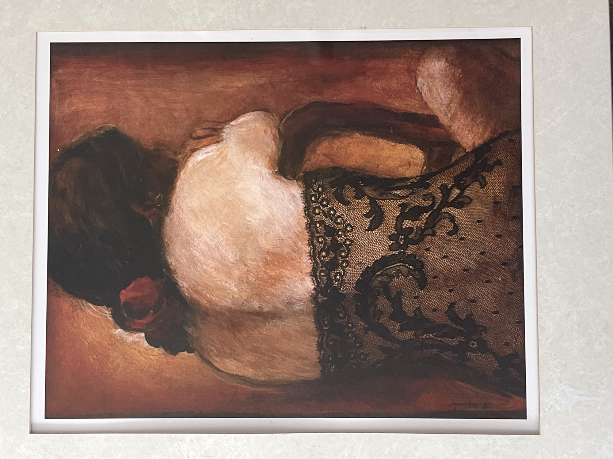 Framed artwork of reclining woman observed in Ocean City