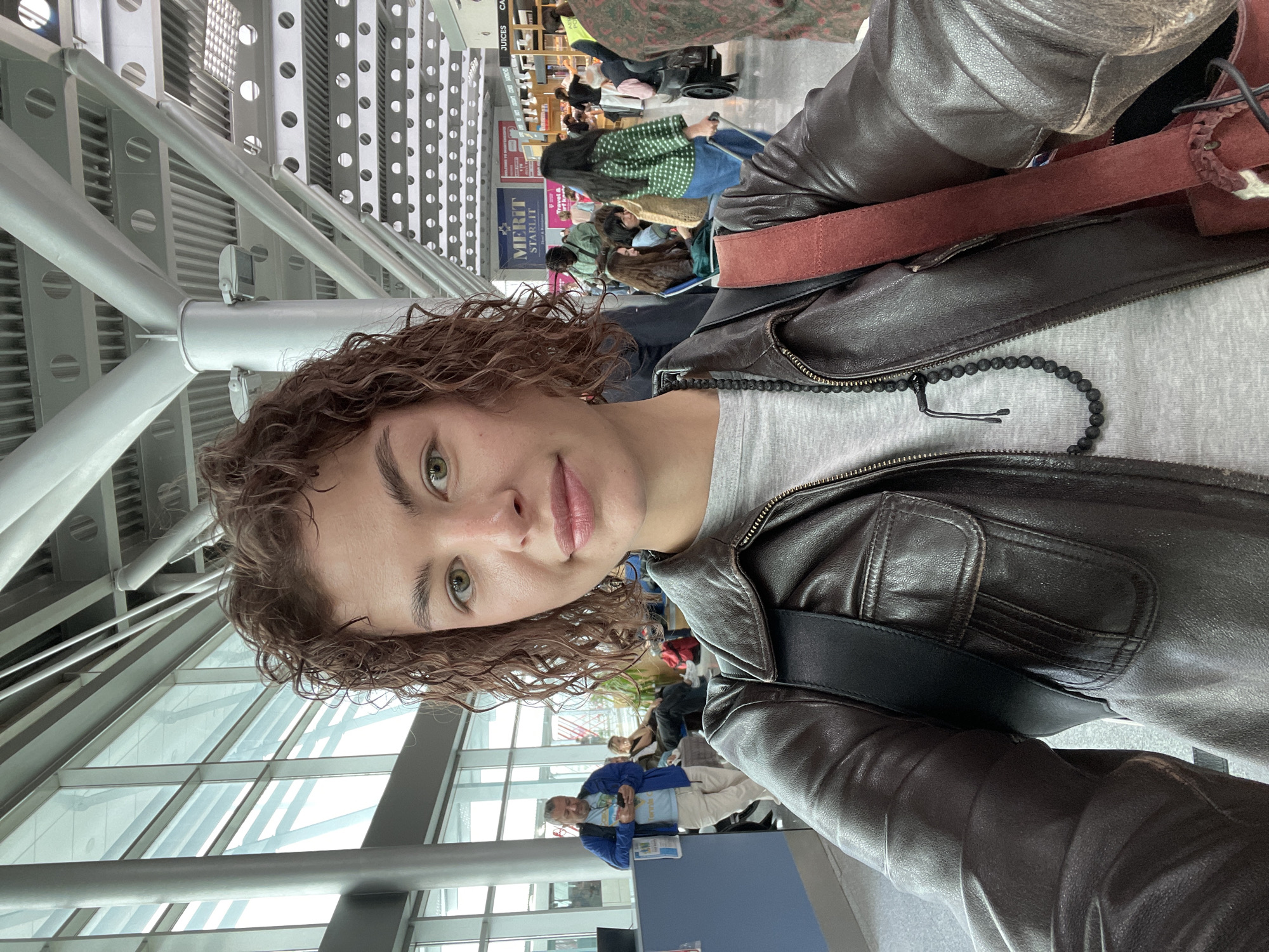 Person takes selfie at apparent airport in Podgorica