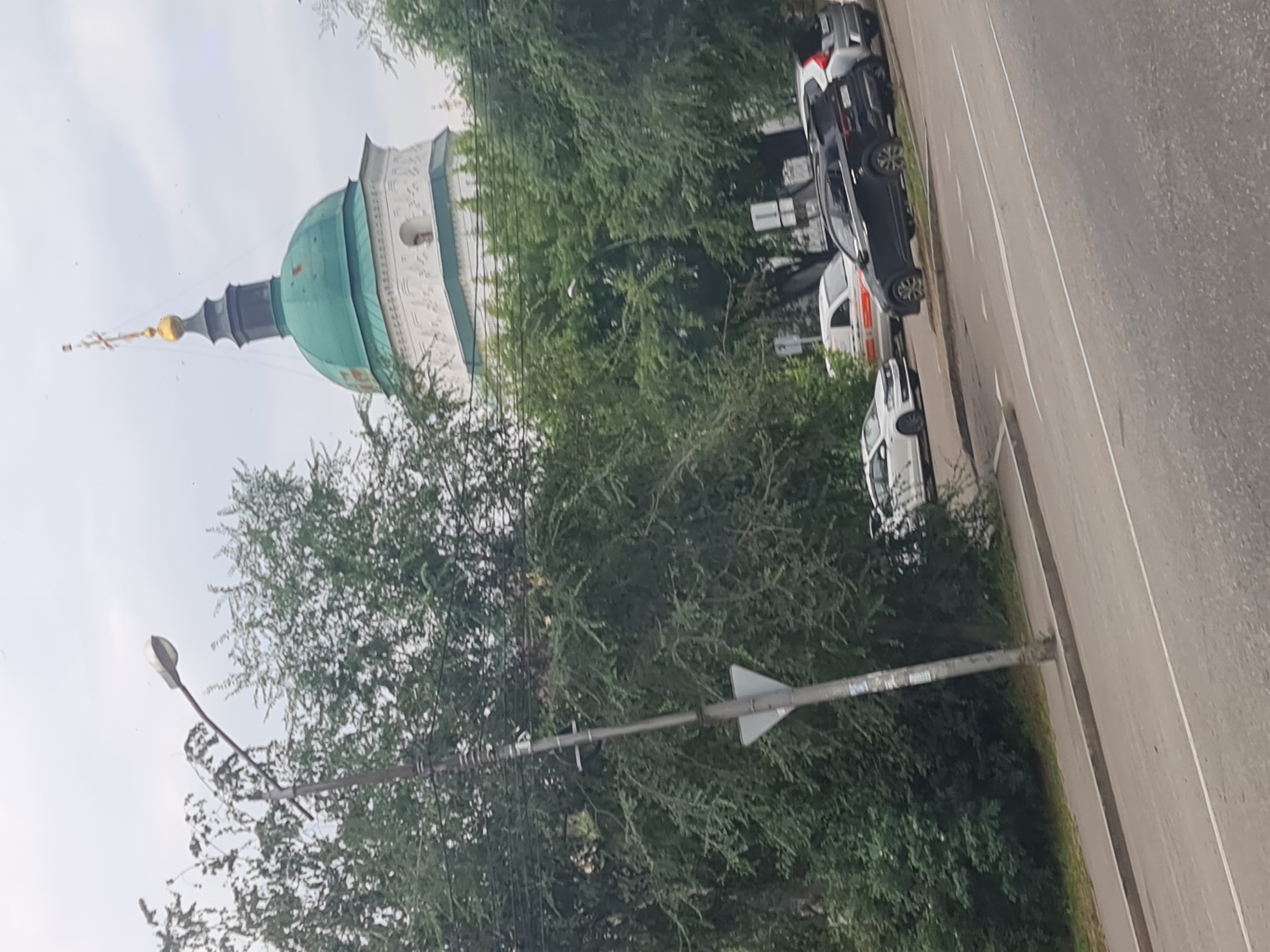 Two angles on an Irkutsk street mixing Soviet-era and modern architecture
