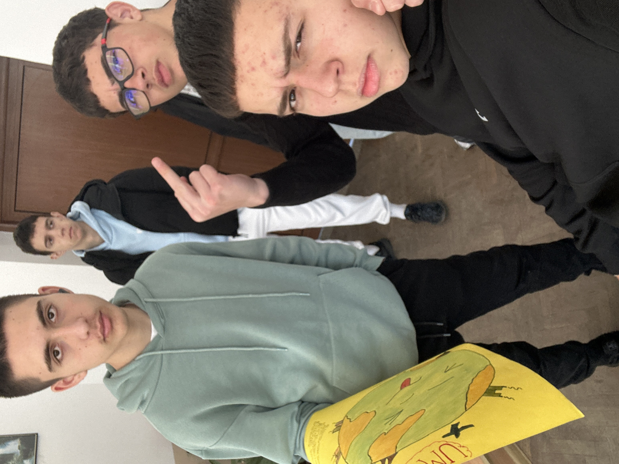 Students present environmental protection poster in Bulgarian classroom