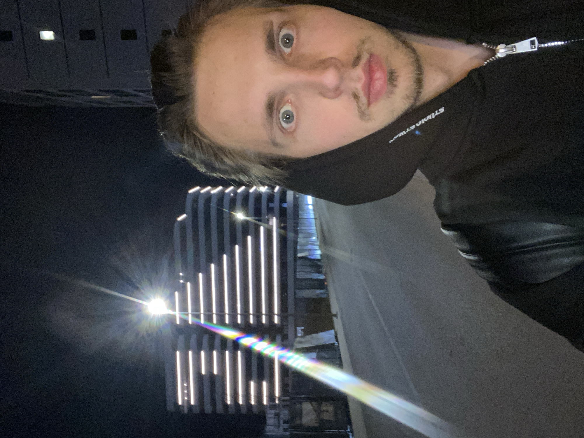 Man takes nighttime selfie in Bar, Montenegro