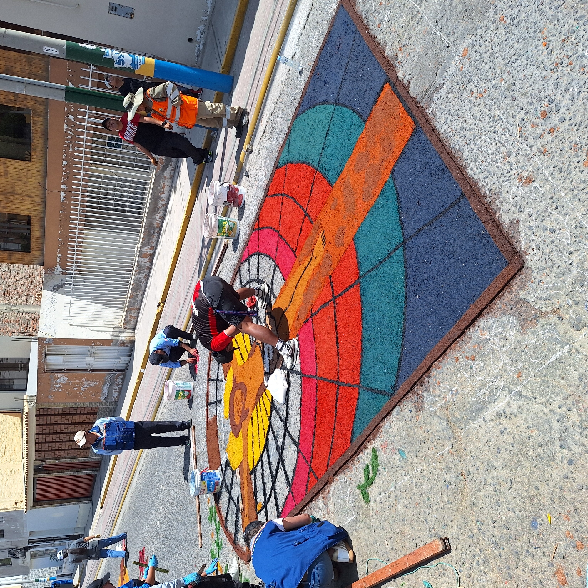 Community creates colorful sand street art in Peru