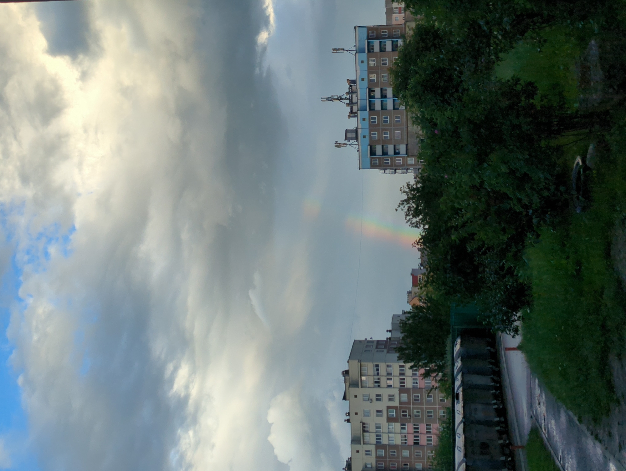 Rainbow over wet streets in Hrodna after summer rain