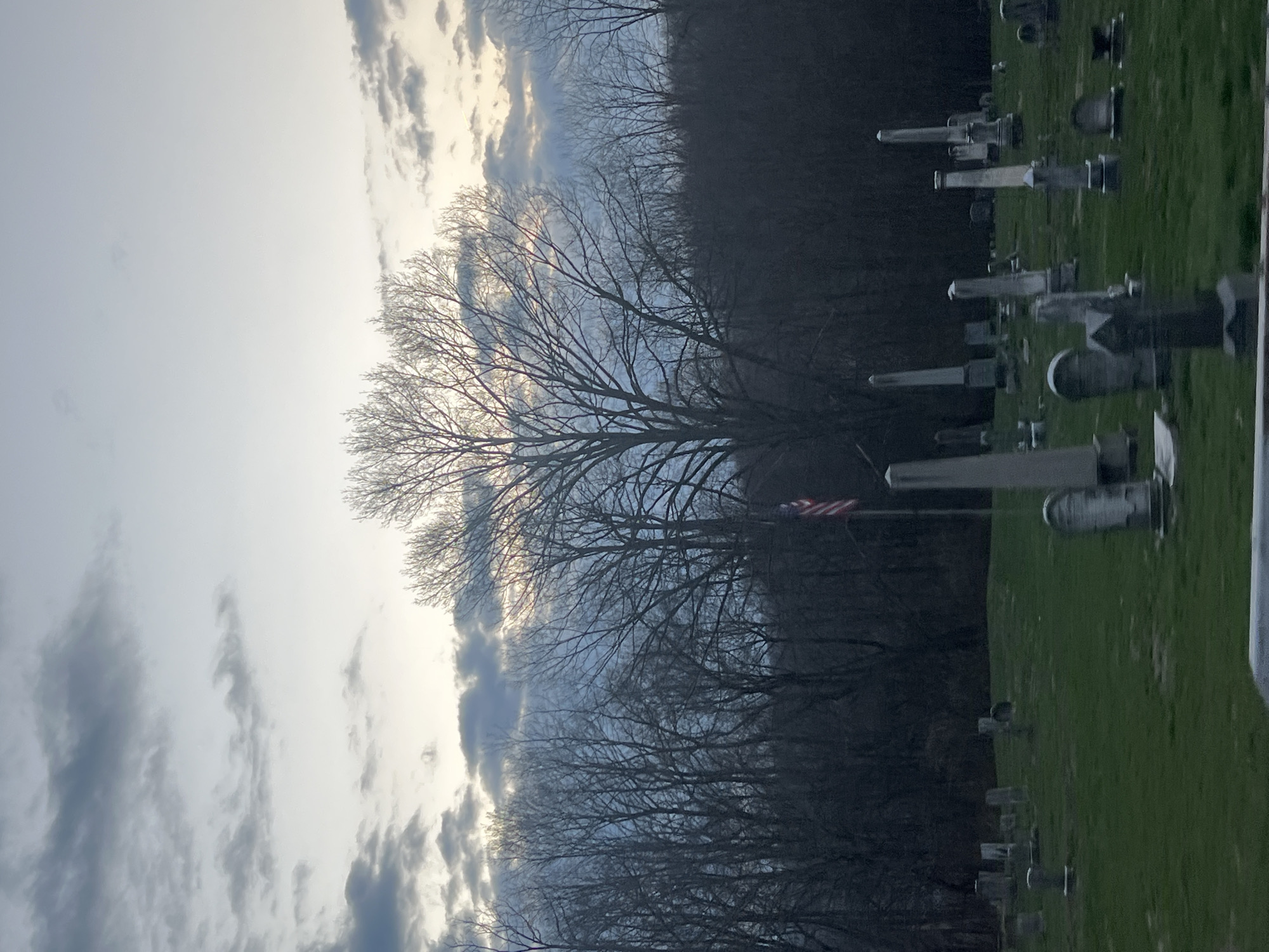Marlboro scenes: graveyard with flag, house with eagle sculpture
