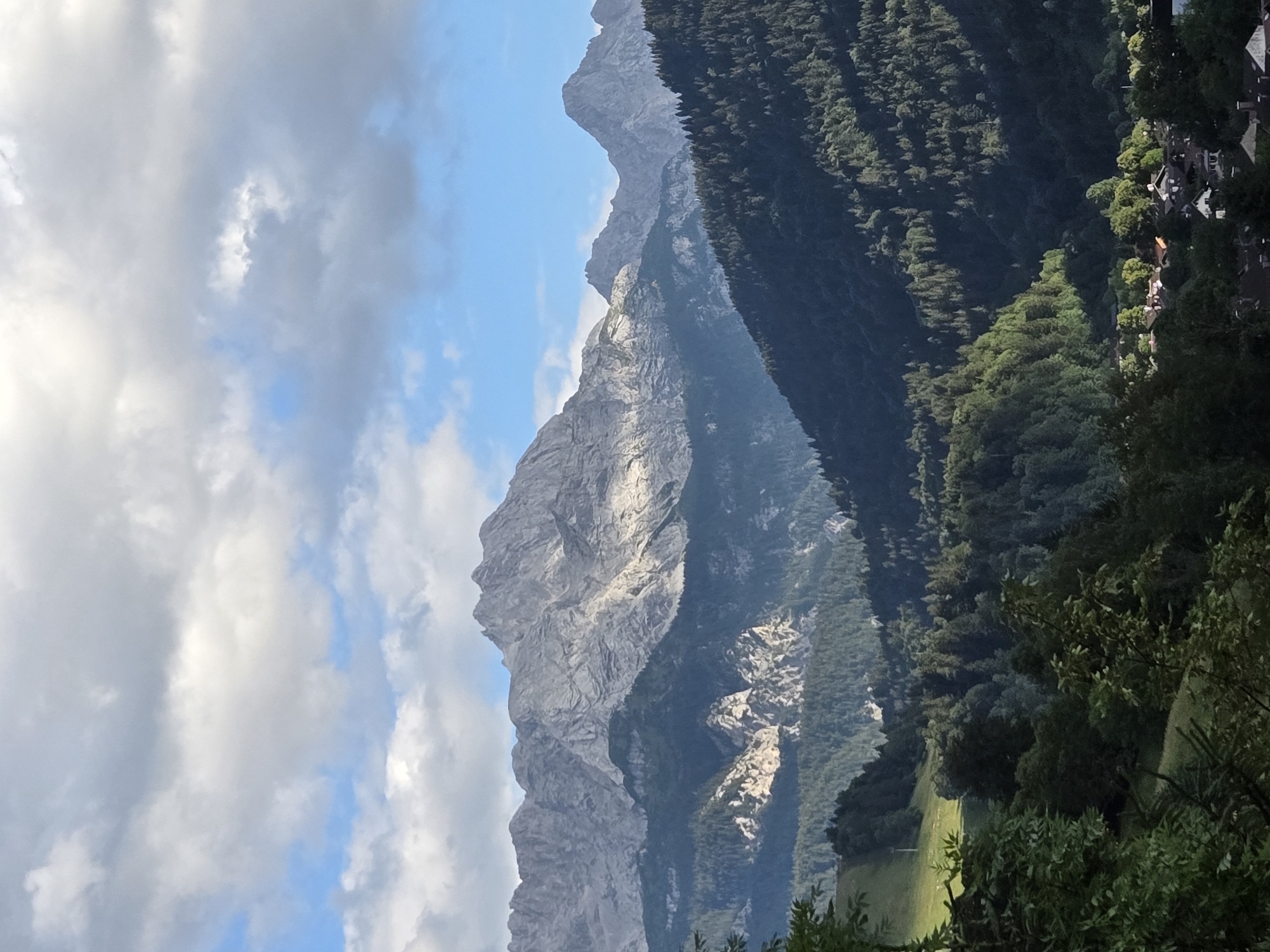 Garmisch-Partenkirchen sits beneath the Alps on a clear summer day