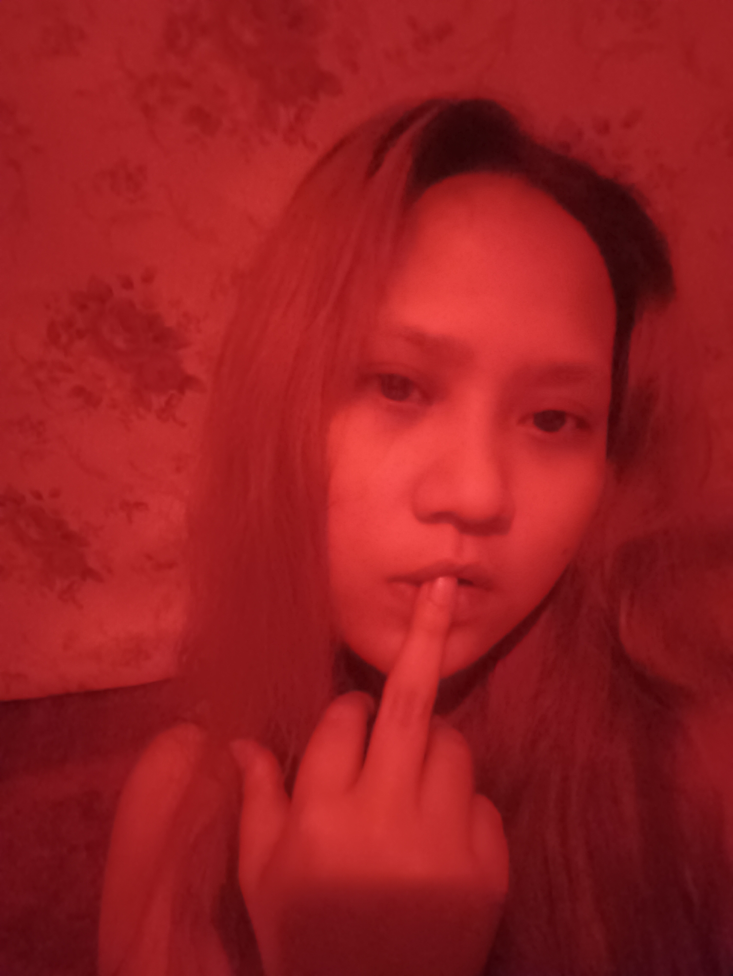 Indoor selfie session with colored lighting in Depok