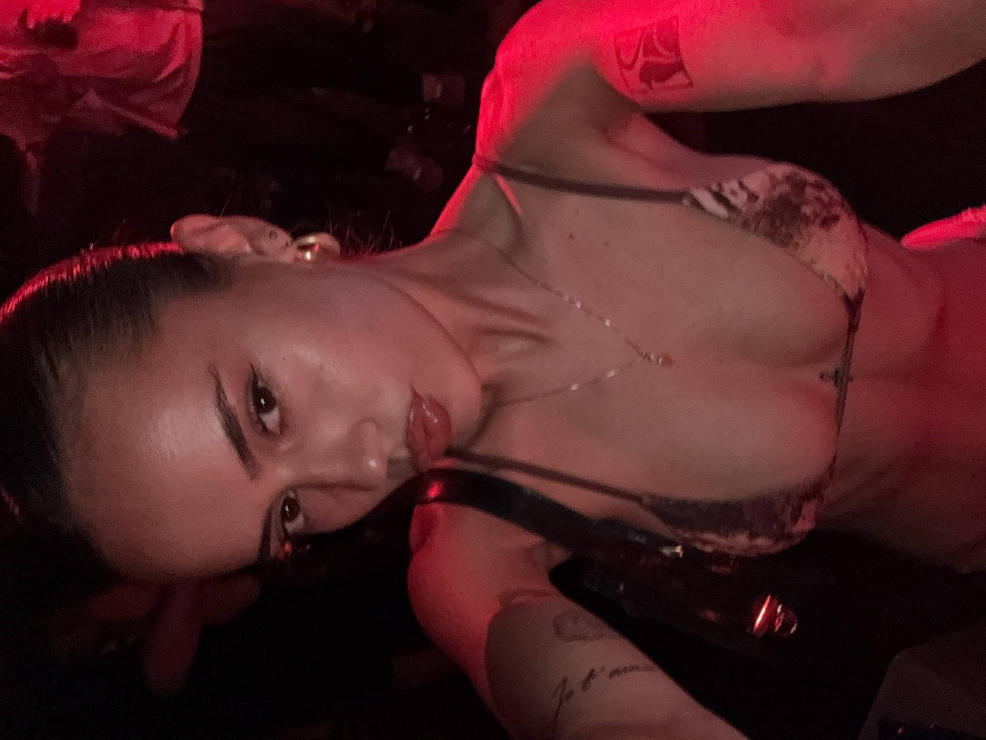 Red-lit pool party night in Żebbuġ, Malta