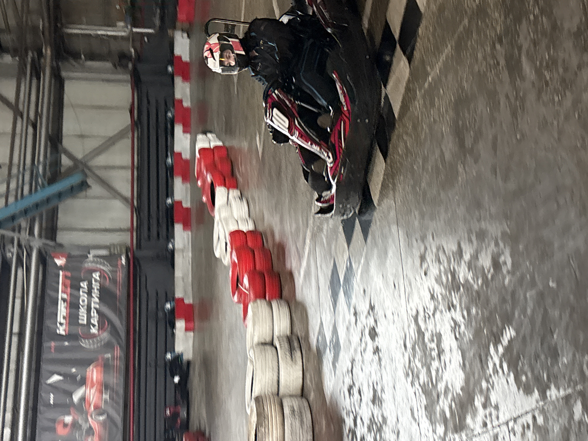 Indoor go-kart racing session captured at Perm facility