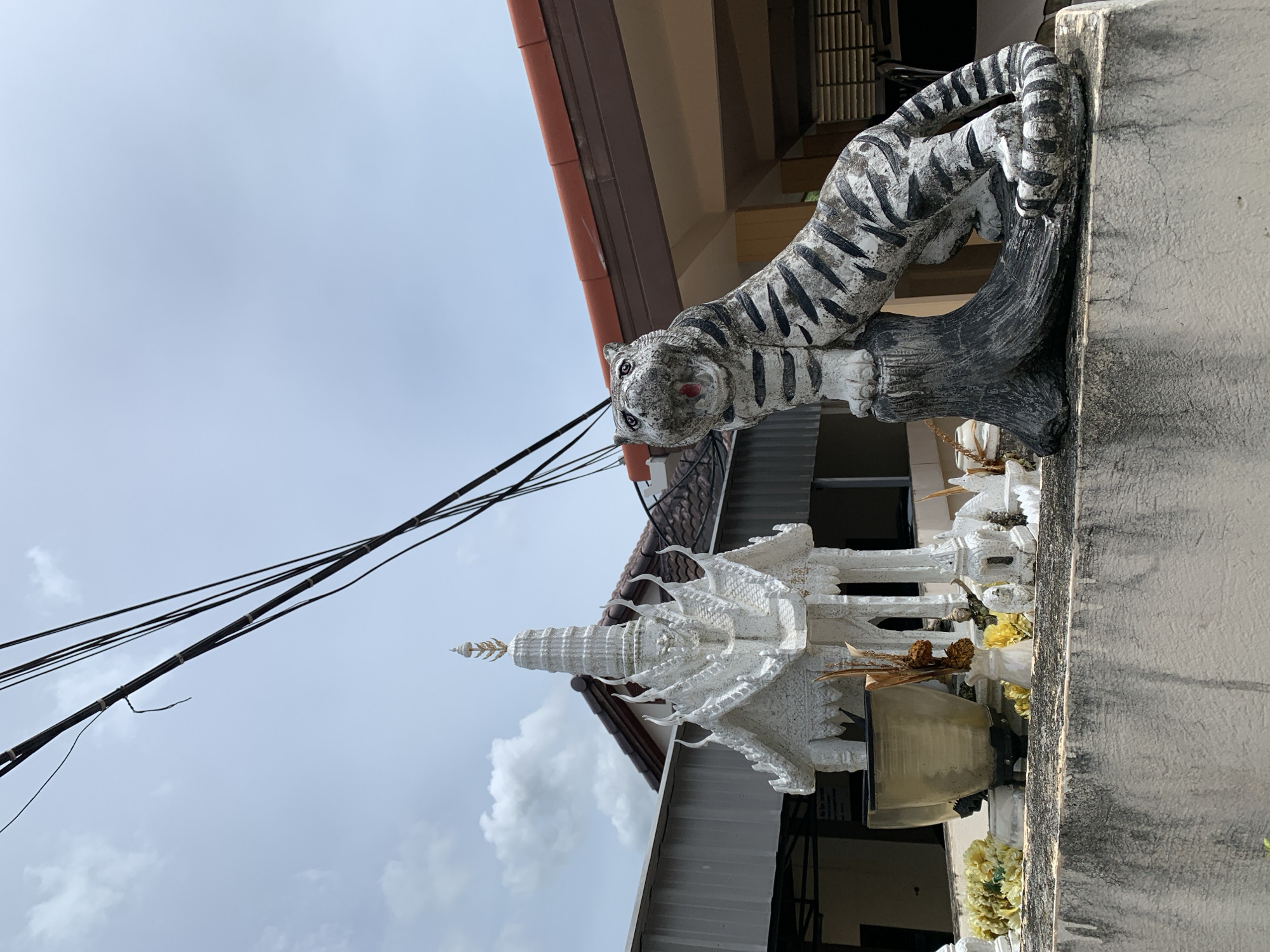 Colorful vehicles and street decor in Ban Bang Rak, Thailand