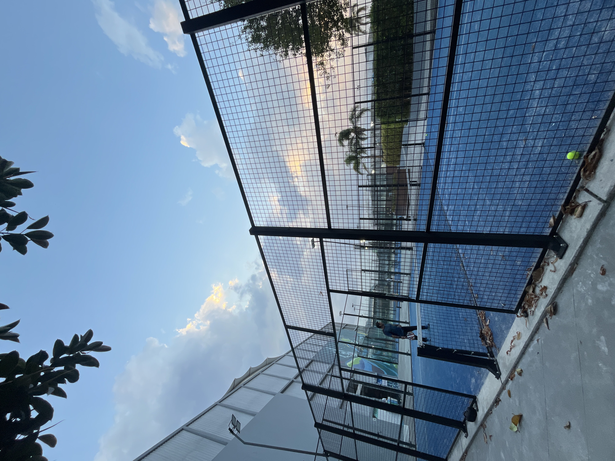 Recreational facility bustling with swimmers and tennis players overnight
