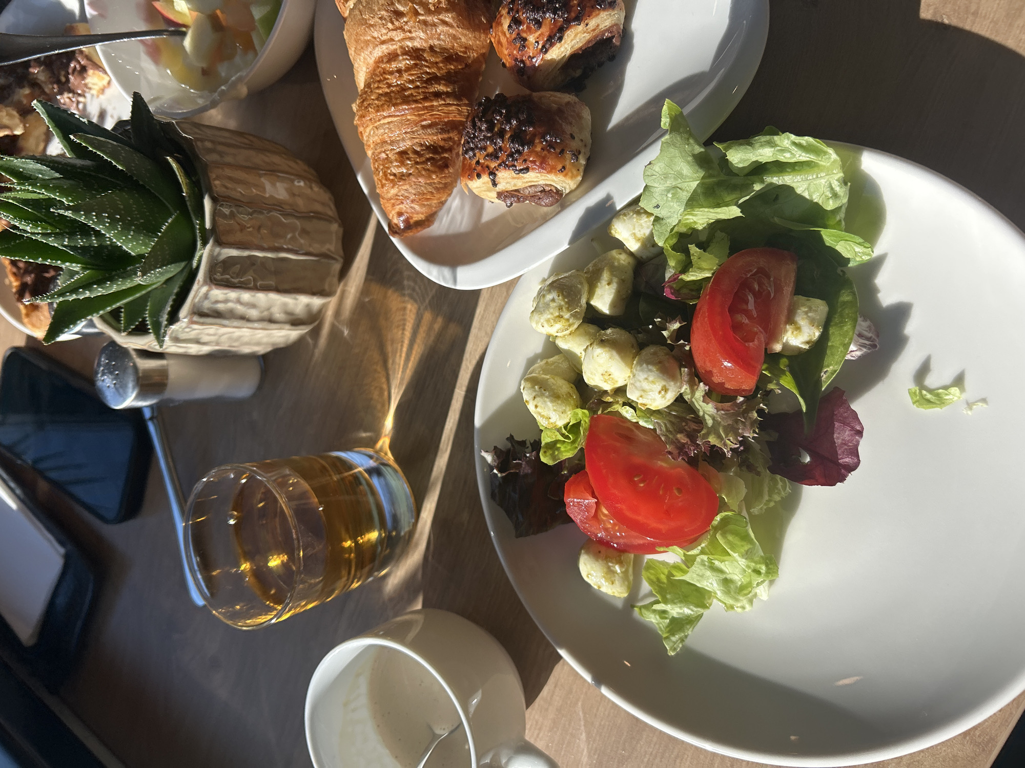 Morning cafe scene captured in sunlit Budapest restaurant