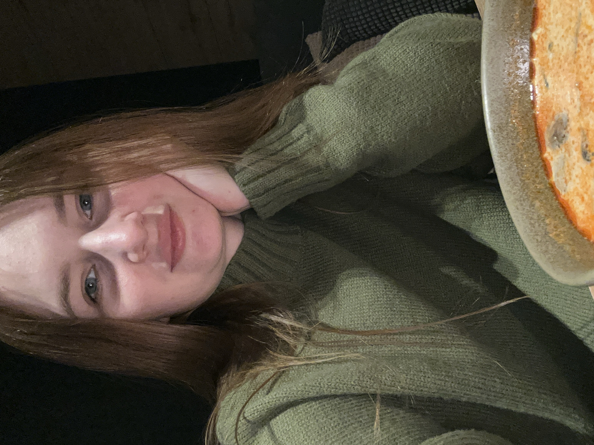 Young woman enjoys morning meal in Chaikovsky, Russia