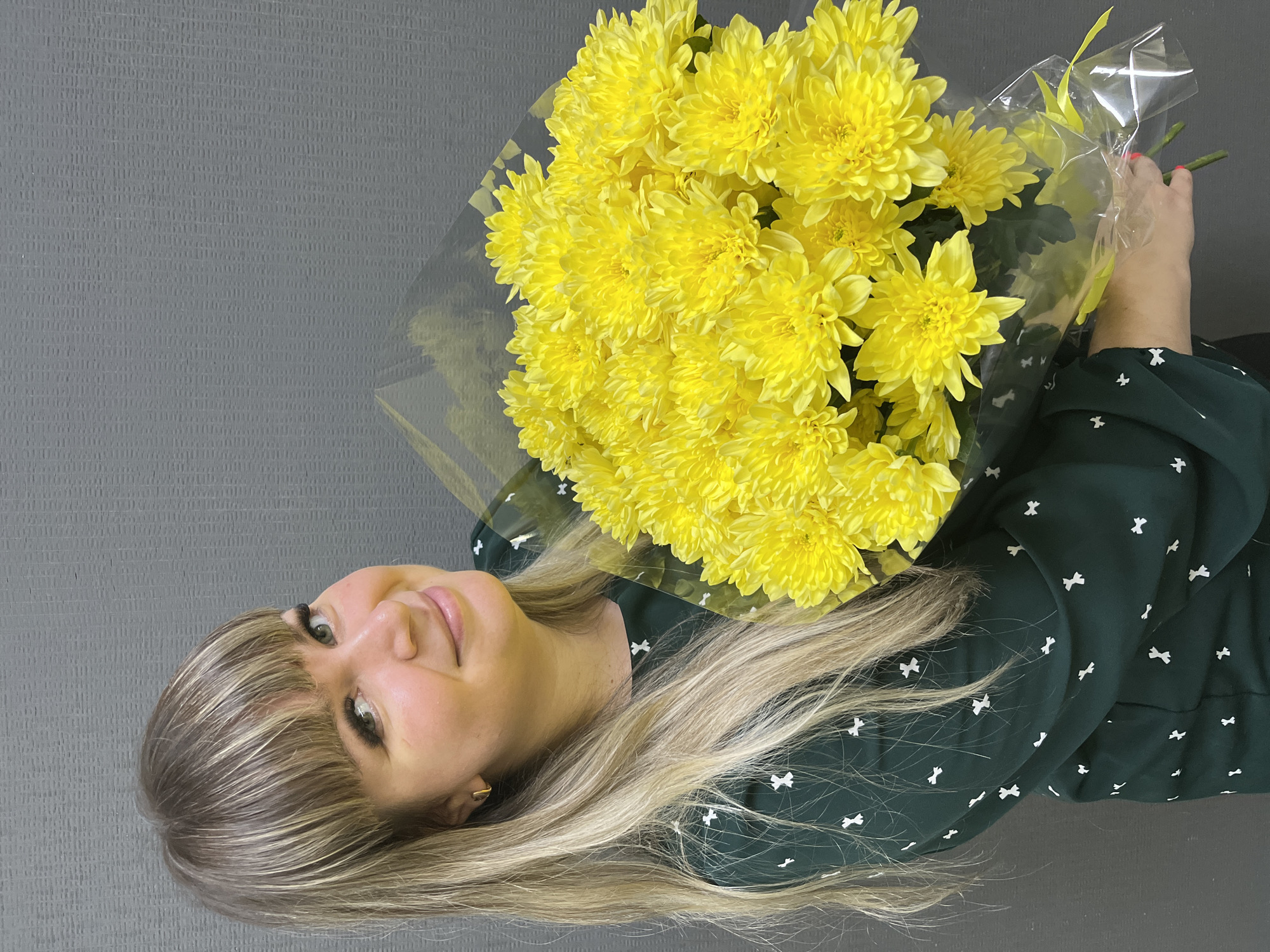 Woman poses with yellow chrysanthemums in early morning Izhevsk portrait