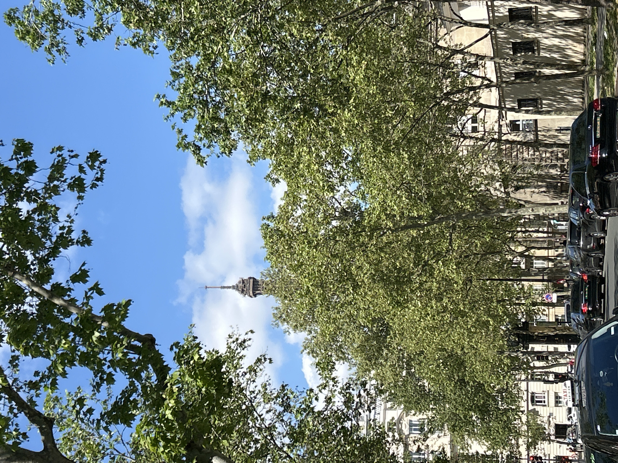 Sunny Paris street scenes captured near Eiffel Tower
