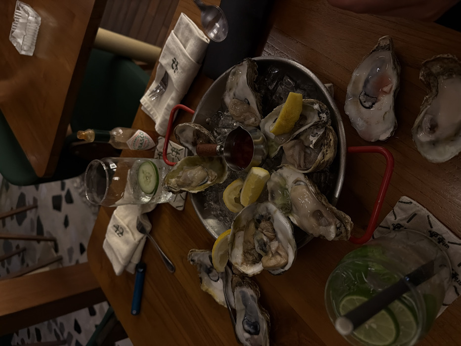 Diner enjoys fresh oysters at Canggu restaurant