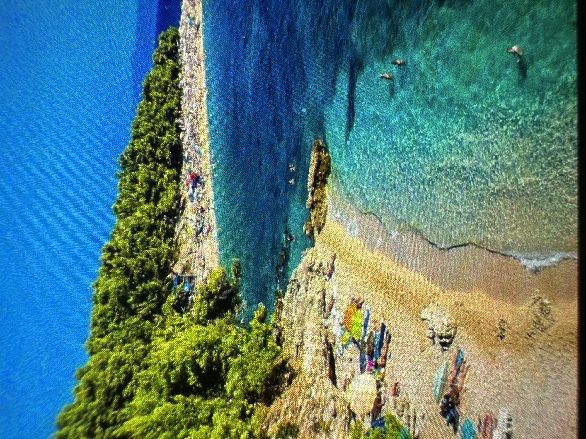 Mediterranean coastlines, a castle, a waterfall, and a podium speech