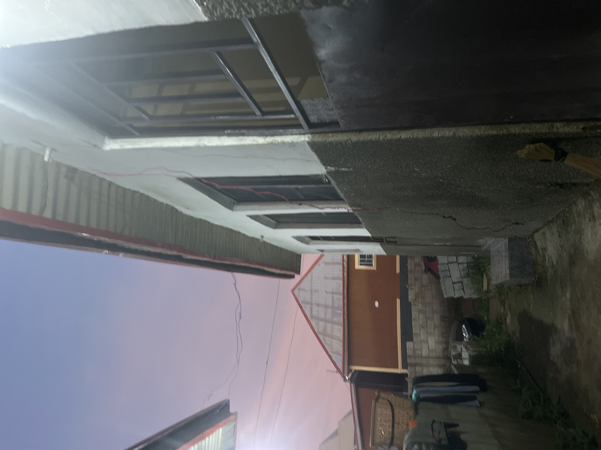 Urban dawn documentation: man in alley during twilight hours