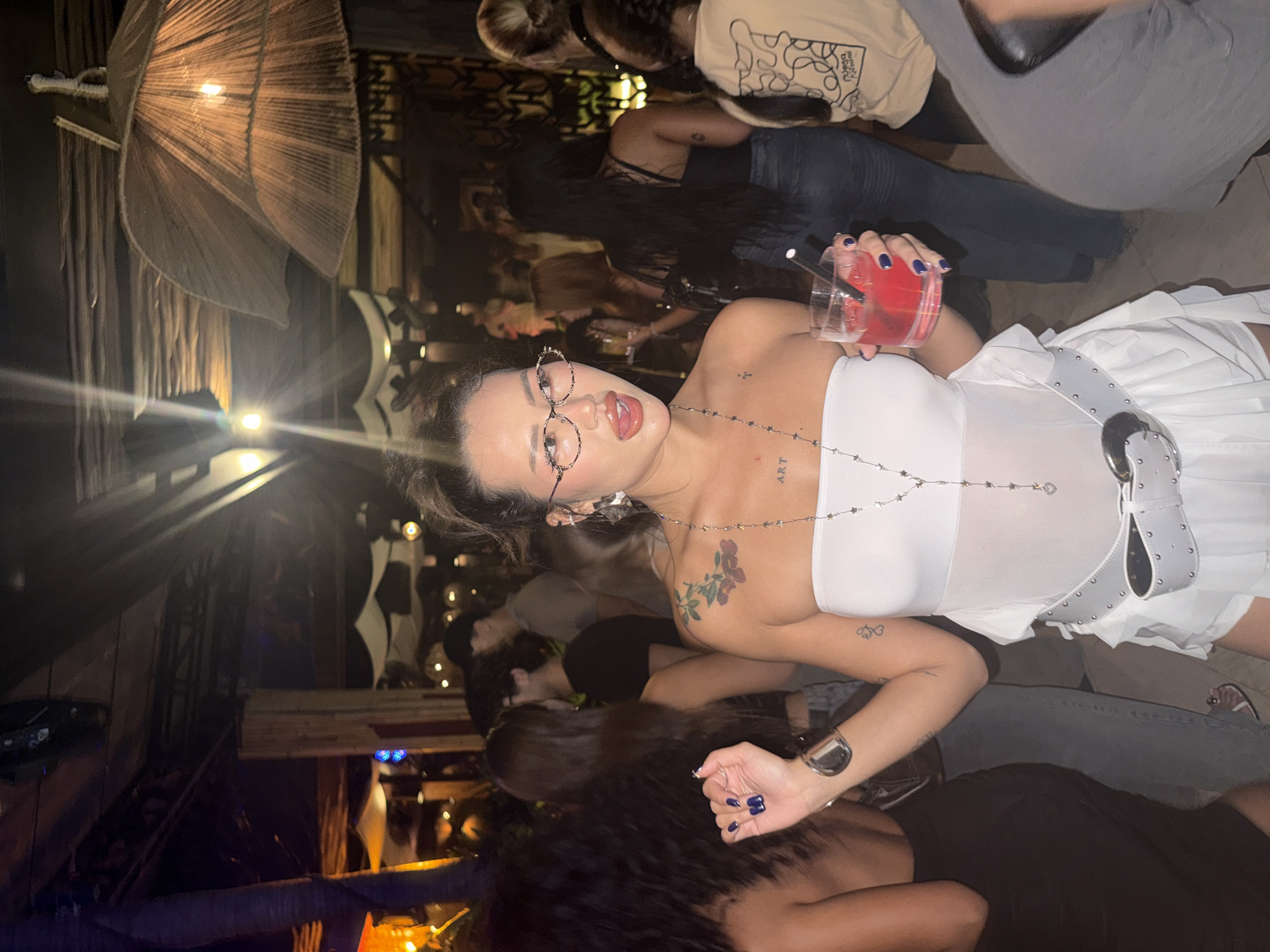 Evening social gathering at tropical nightclub in North Kuta