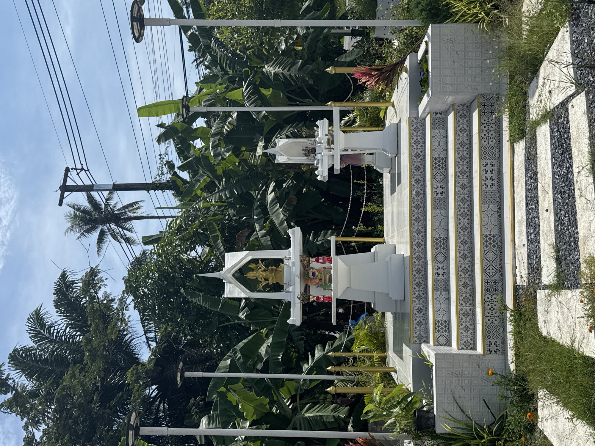 Lakeside resort venue in Nikhom Phatthana, fish, flowers, and construction