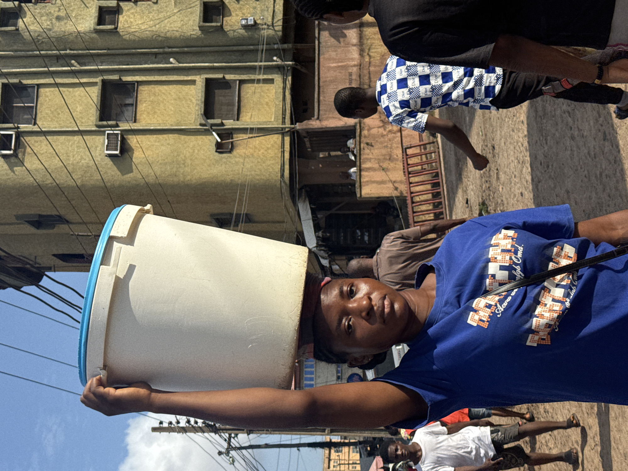 Street-level moments from a busy morning in Anambra State