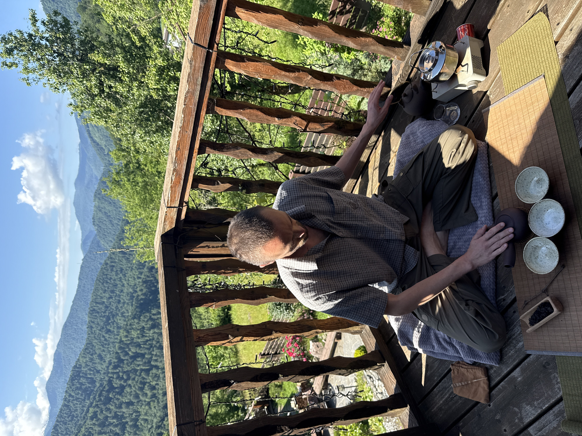 Morning tea ceremony and yoga session in Russian mountains