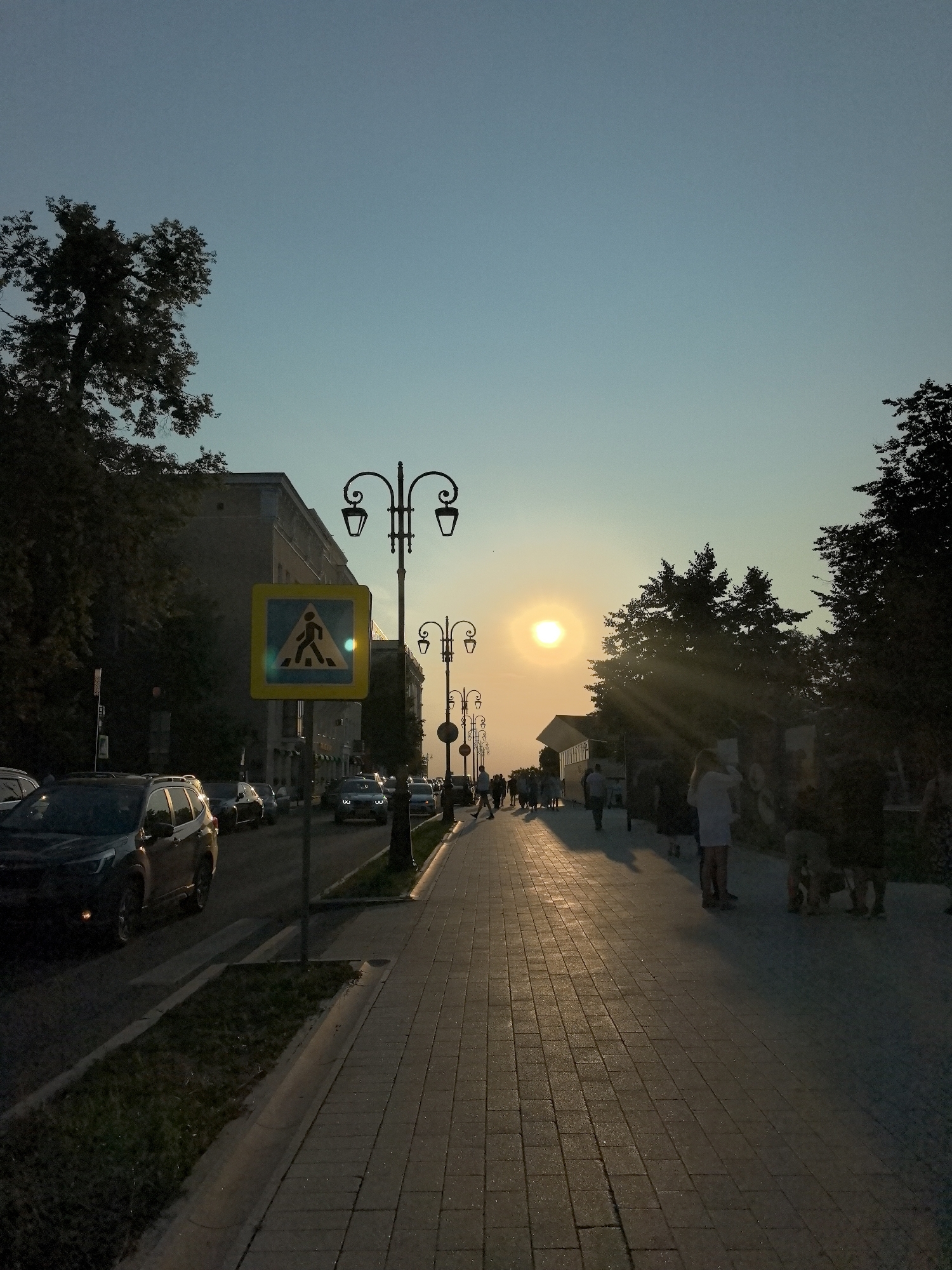 Summer evening around a red ice cream truck in Nizhny Novgorod