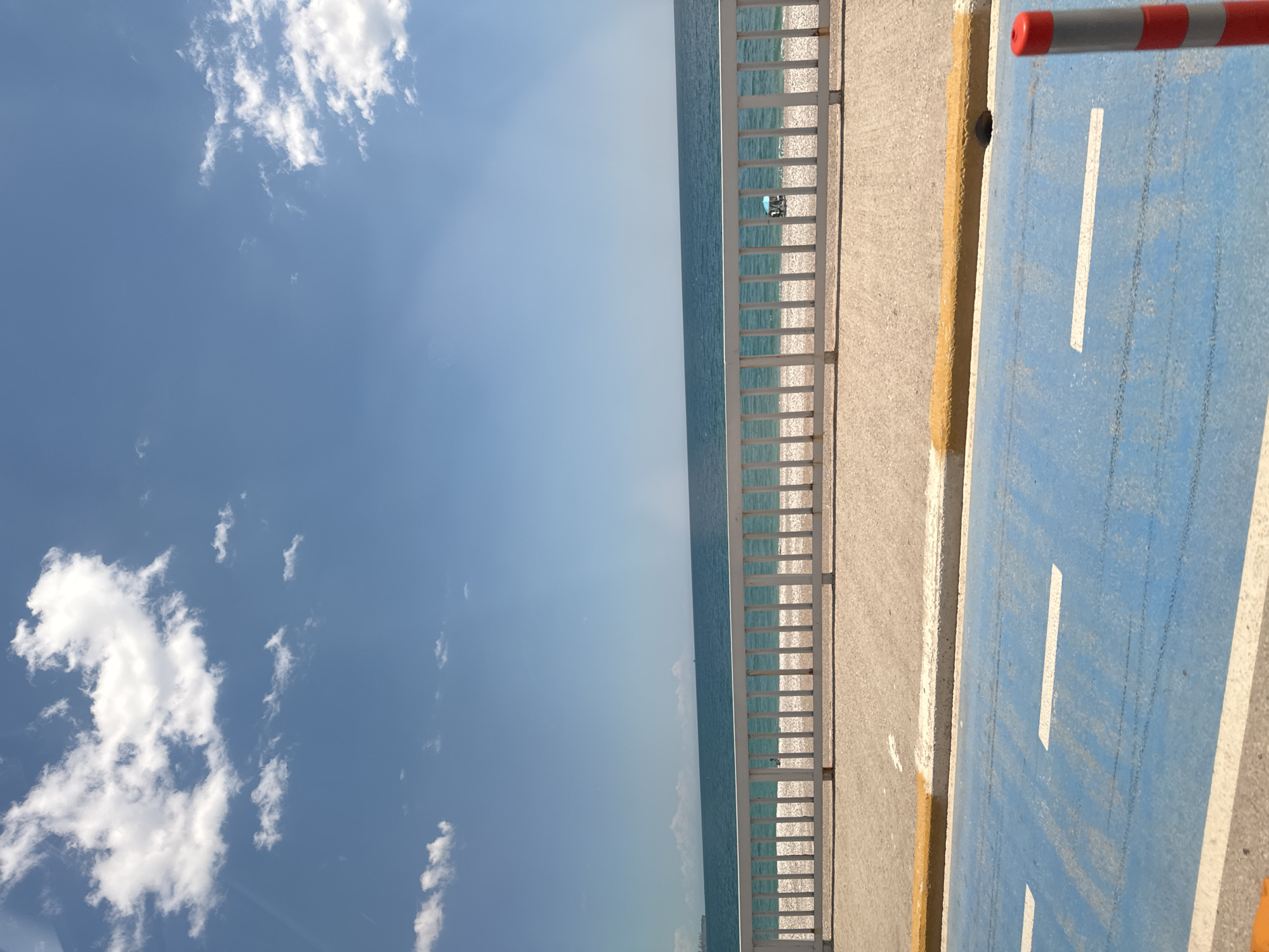 Sunny day coastal scenes captured at Konyaaltı Beach, Turkey