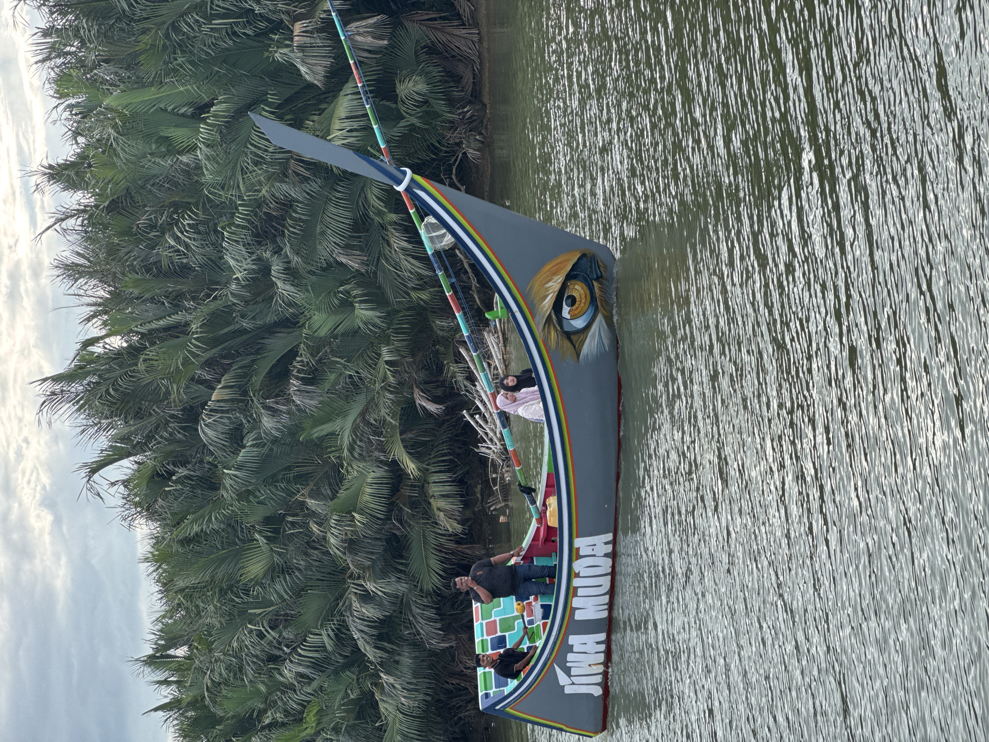 Traditional boats and river life along Reudeuep's calm waterways