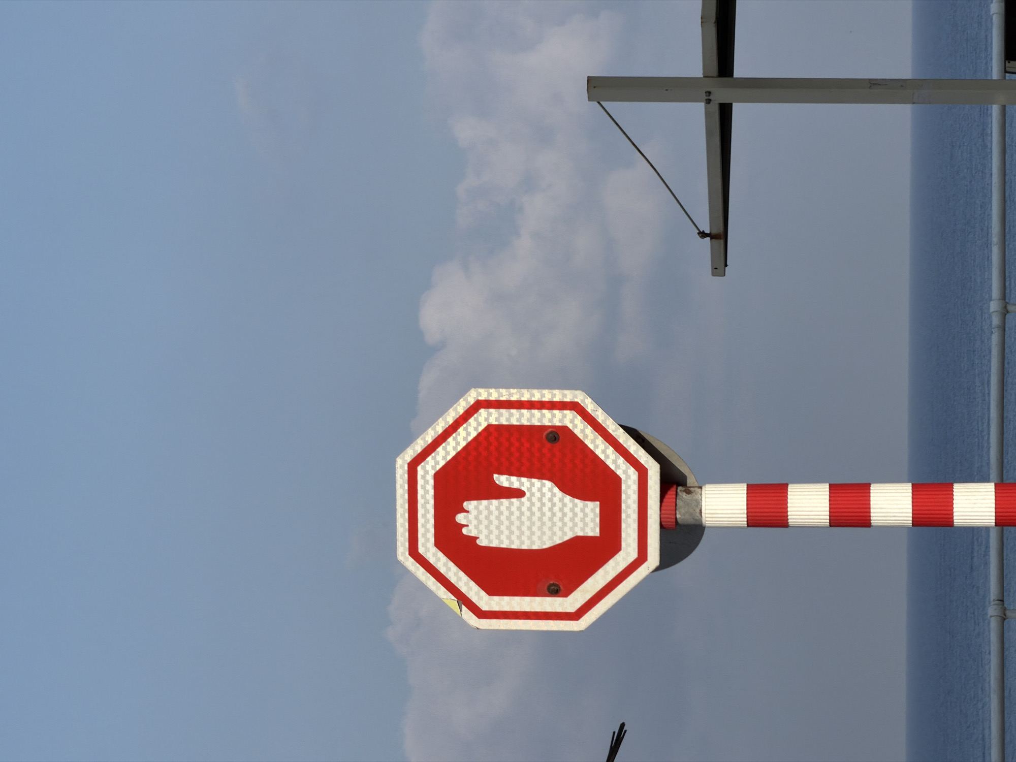 Street-level stop sign with hand symbol, Bat Yam, Israel