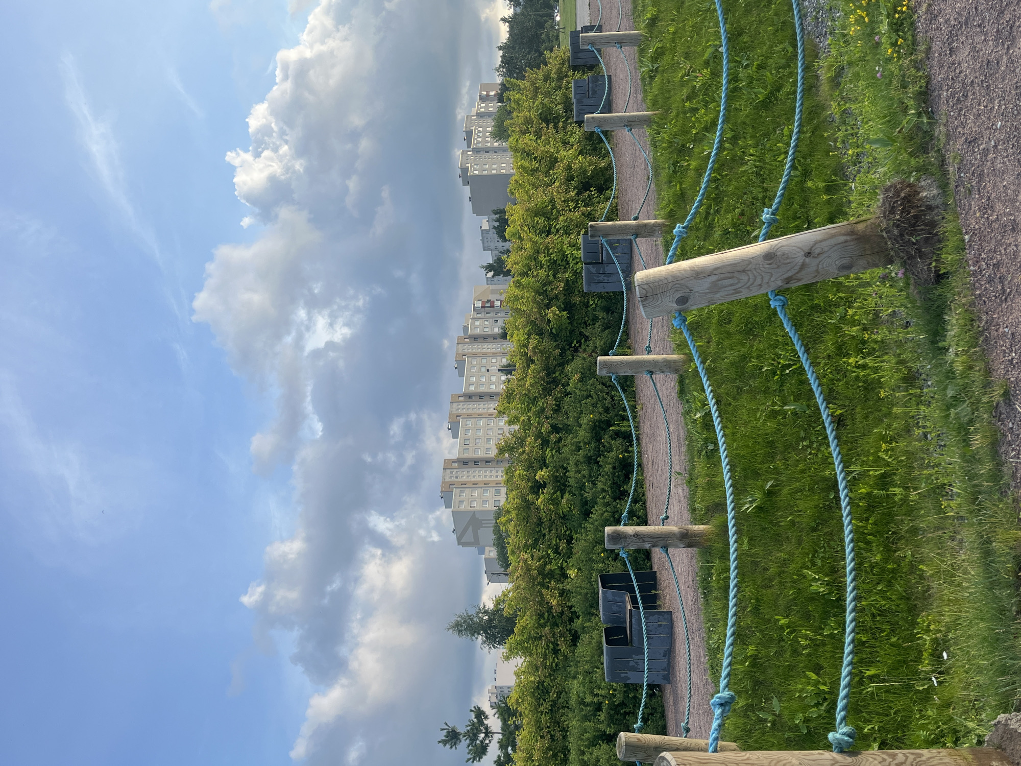 Rope obstacle course and green pathways in a Tallinn park