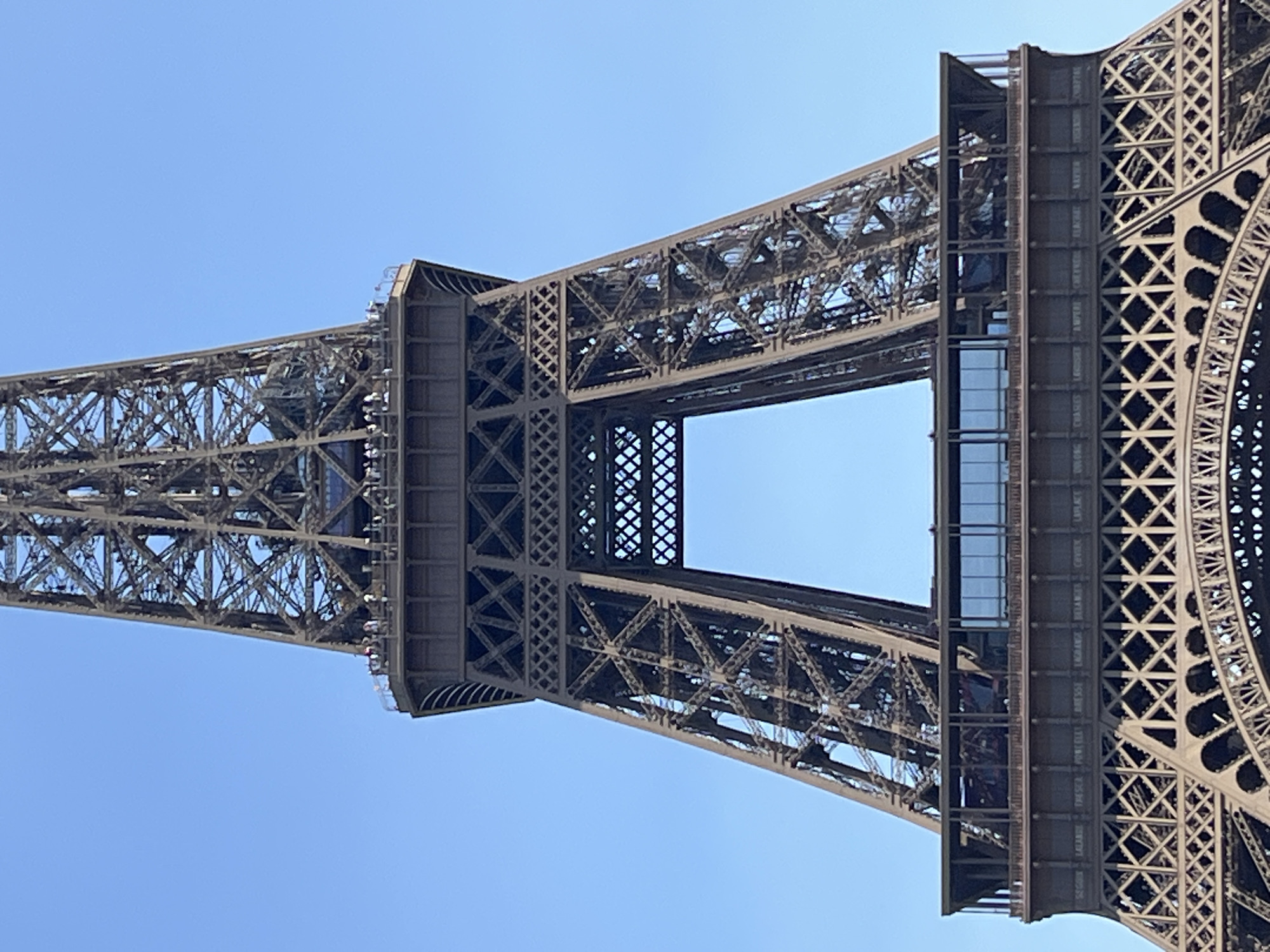 Eiffel Tower up close on a sunny Paris afternoon