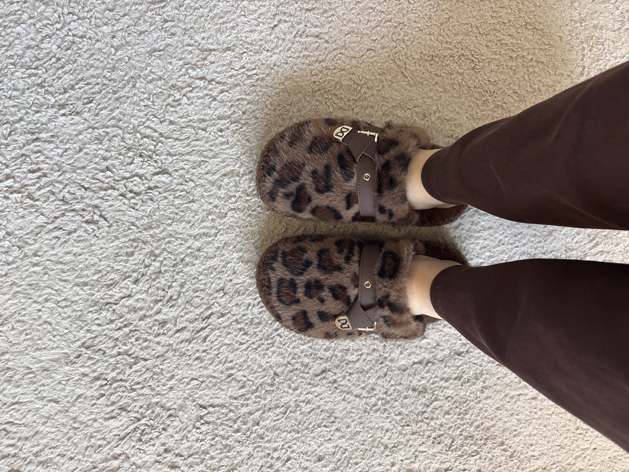 Person in leopard slippers spotted on carpet in Bulgaria