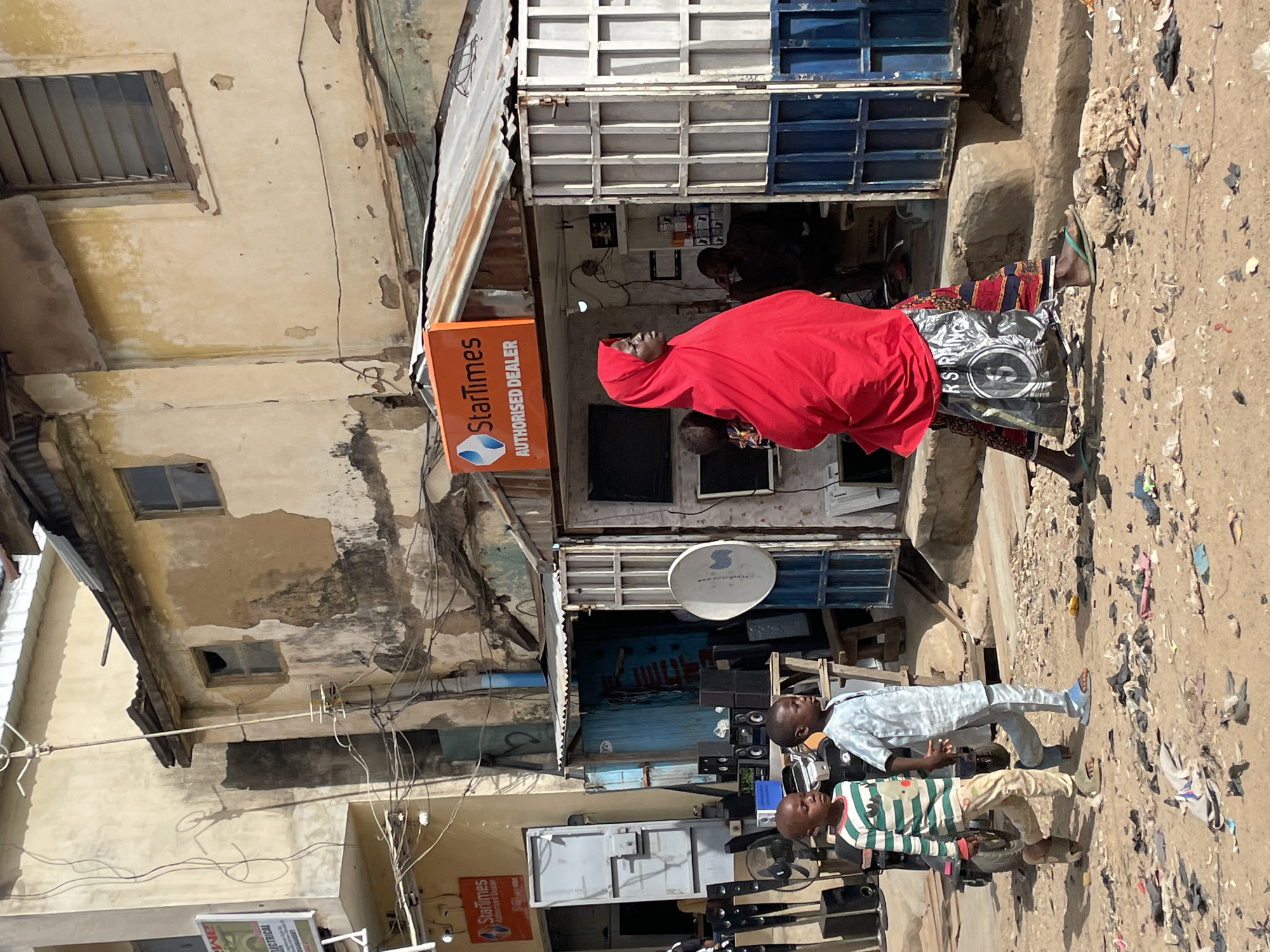 Everyday street life documented across Jos, Nigeria commercial district