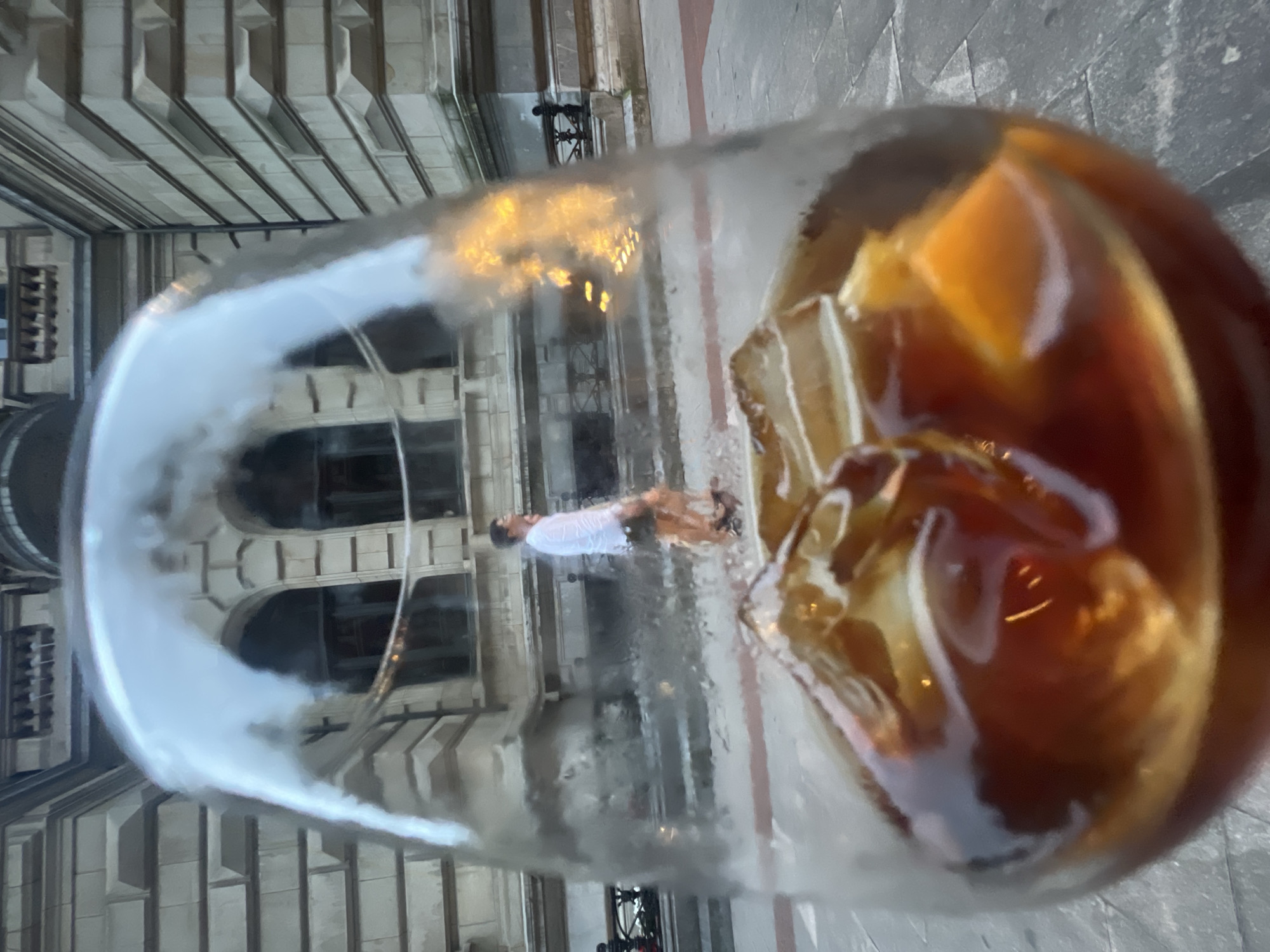 Bilbao evening: old stonework, glass towers, and drinks out