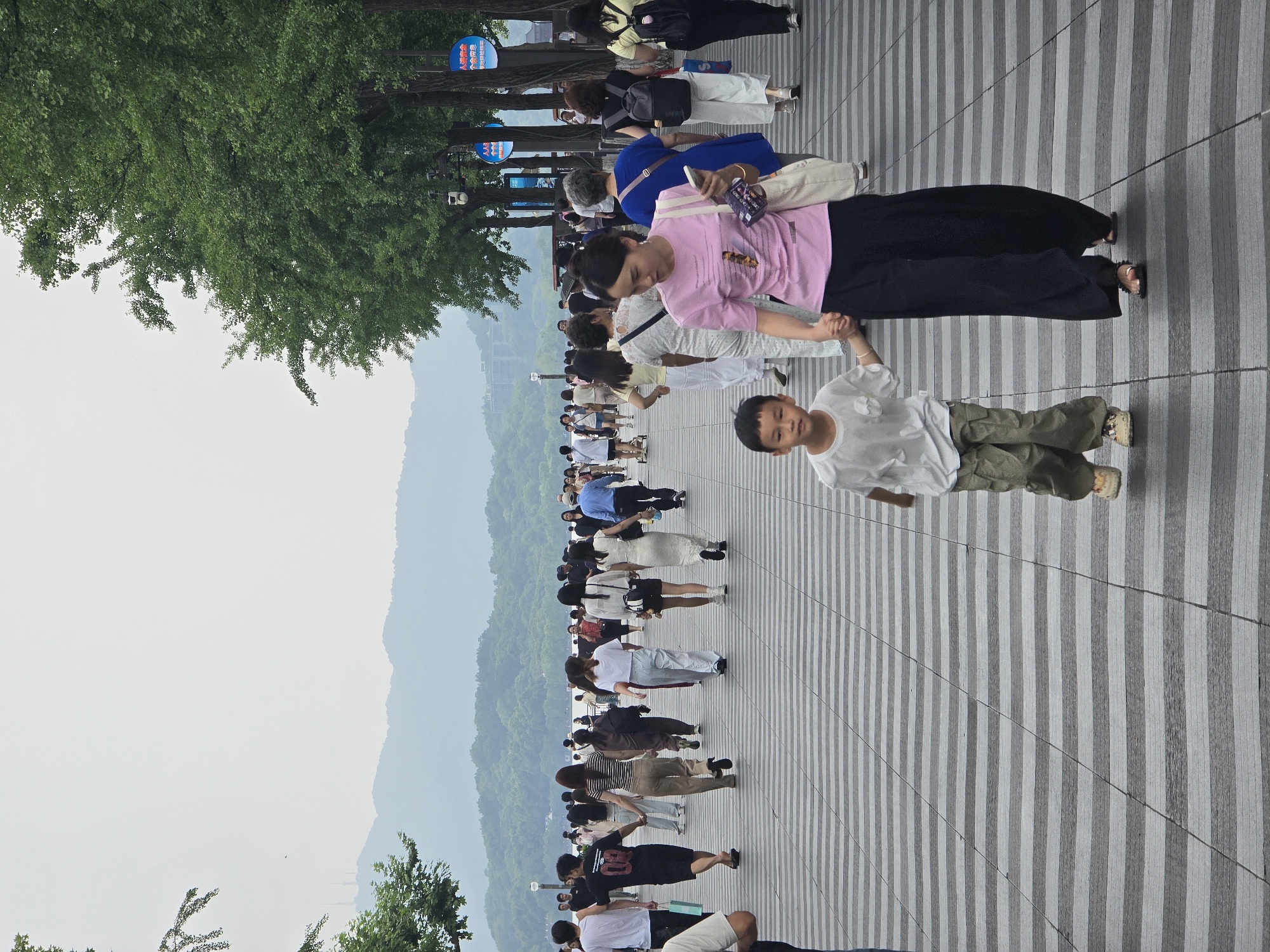 Morning crowds gather around Apple Store in Shangcheng District